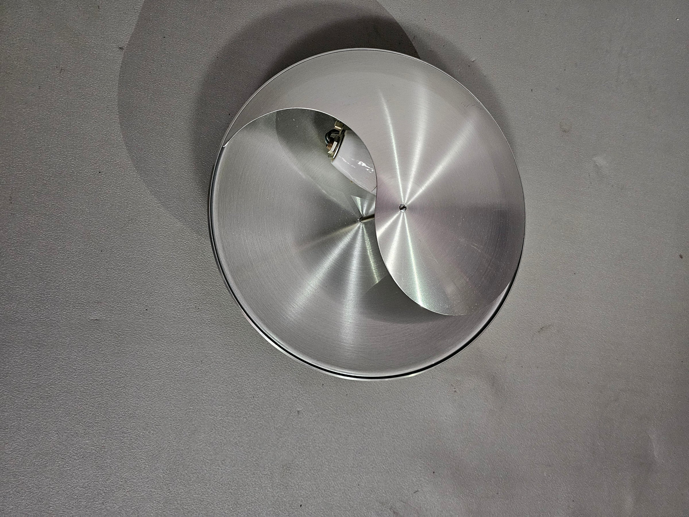 vintage design inox wall lamp from Raak Amsterdam (type C1636). Also called Yin-Yang lamp
