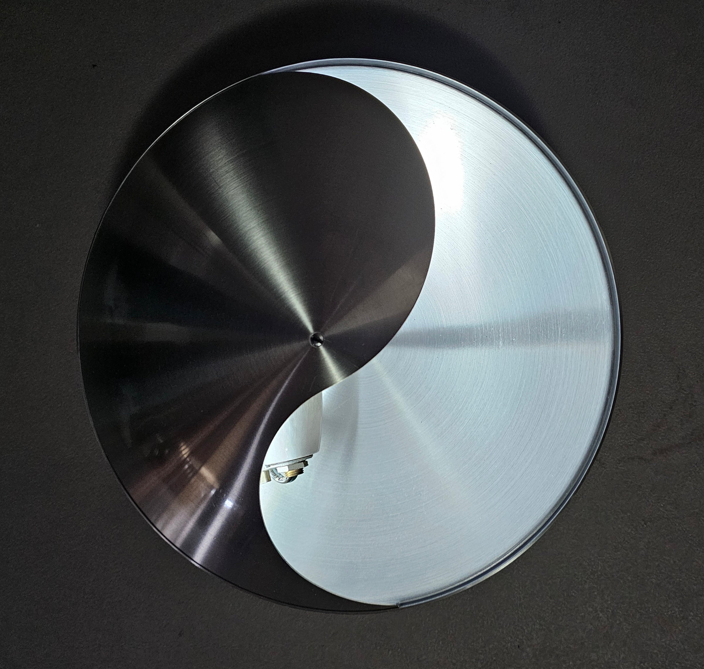 vintage design inox wall lamp from Raak Amsterdam (type C1636). Also called Yin-Yang lamp