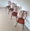 4 x wheelback / Windsor chairs / marked