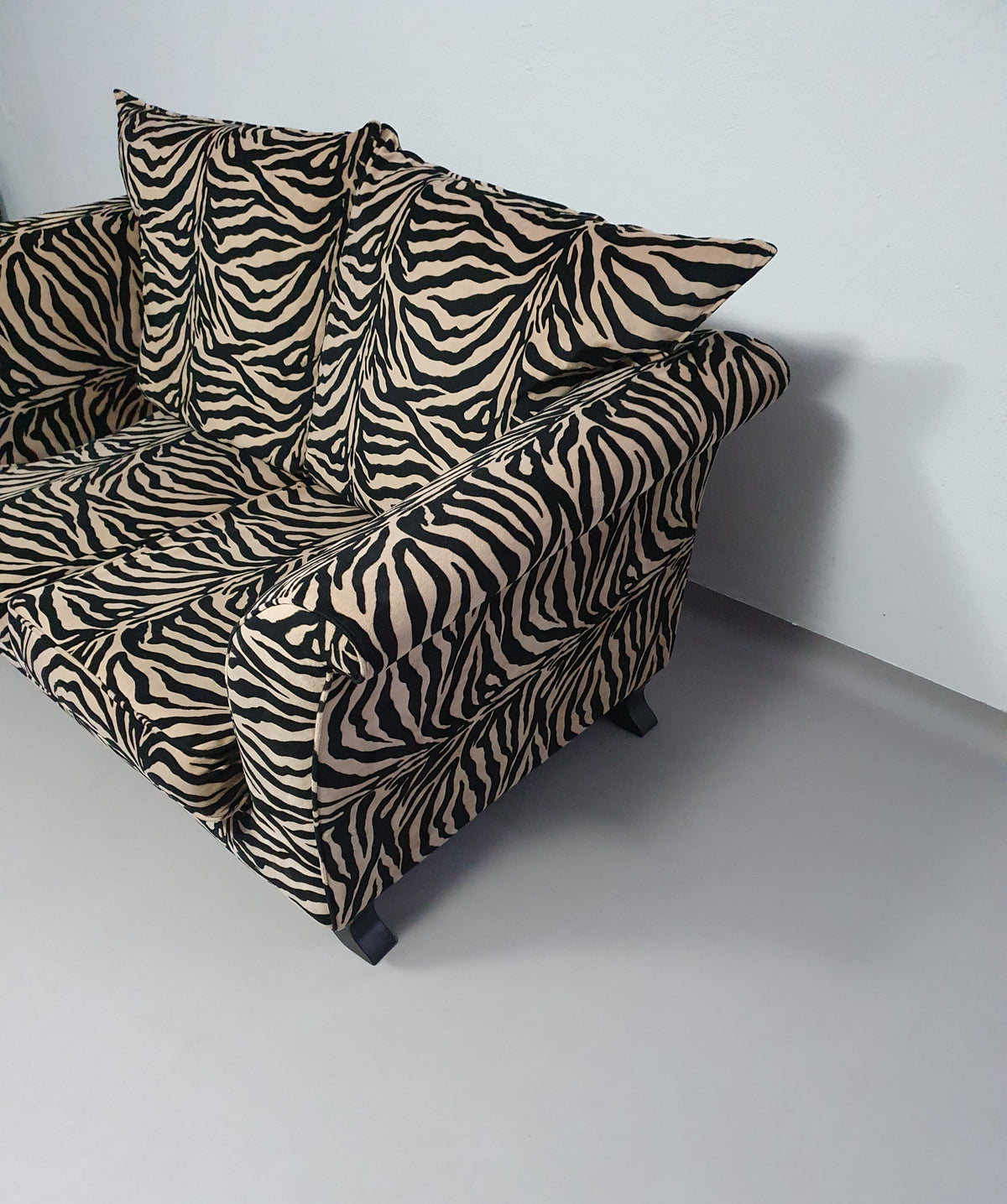 Weighty 80's zebra print sofa. Very good condition.