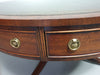Mahoniehouten Victoriaanse "Heldense" salontafel / trommeltafel met leren blad op messing wielen. Jaren '80