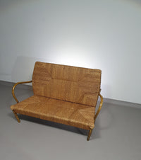 Vintage Franse papercordbank met een metalen frame