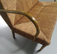 Vintage Franse papercordbank met een metalen frame