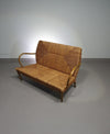 Vintage Franse papercordbank met een metalen frame