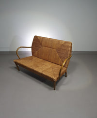 Vintage Franse papercordbank met een metalen frame