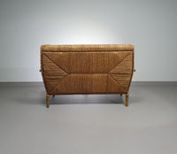 Vintage Franse papercordbank met een metalen frame