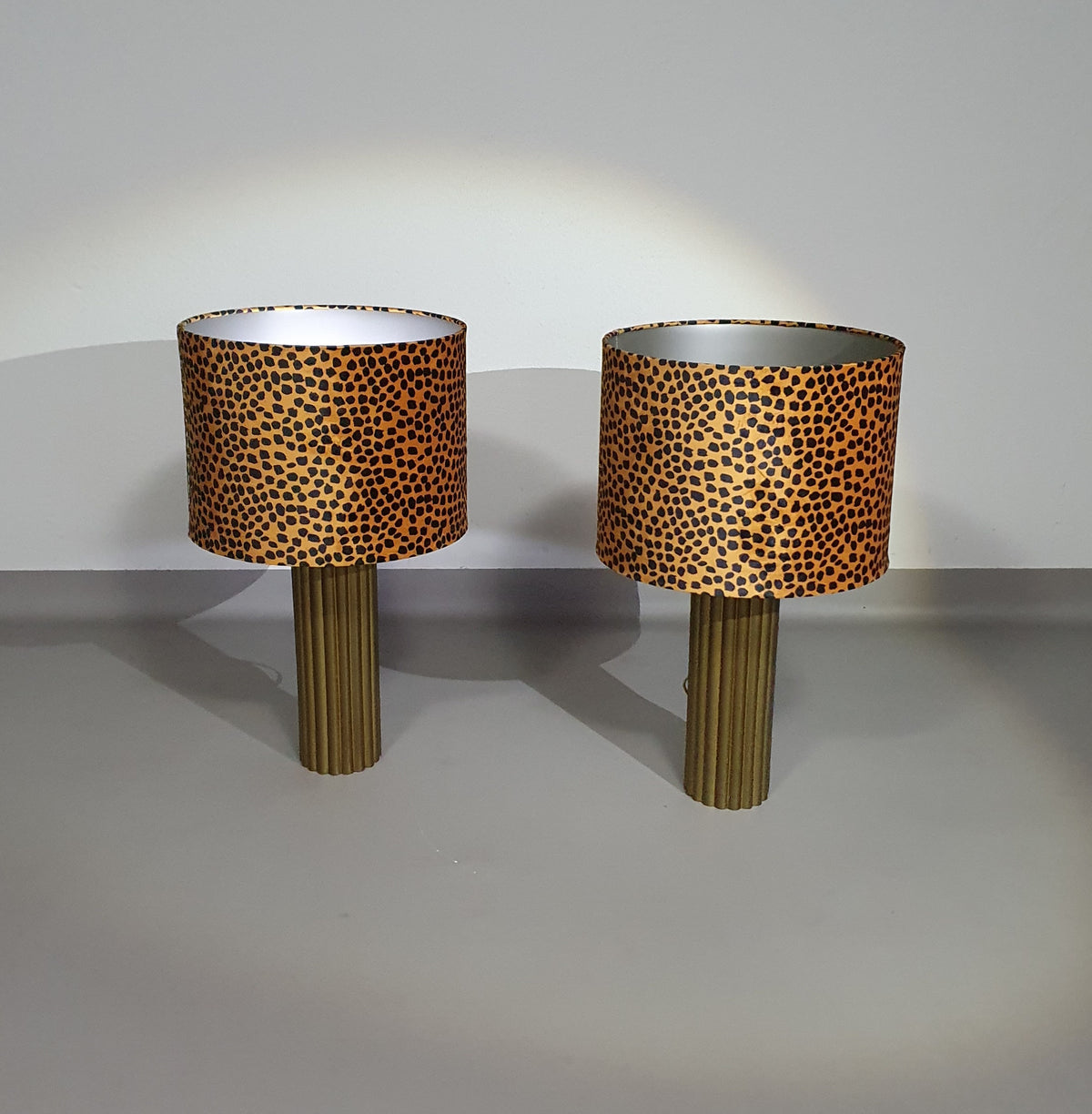 Pair of Kullmann brass table lamps