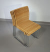 Stapelbare rieten, rotan stoelen (4) model S.21 op een verchroomde stalen structuur. Ontworpen door Tito Agnoli