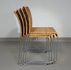 Stapelbare rieten, rotan stoelen (4) model S.21 op een verchroomde stalen structuur. Ontworpen door Tito Agnoli