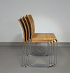 Stapelbare rieten, rotan stoelen (4) model S.21 op een verchroomde stalen structuur. Ontworpen door Tito Agnoli