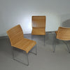 Stapelbare rieten, rotan stoelen (4) model S.21 op een verchroomde stalen structuur. Ontworpen door Tito Agnoli