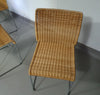 Stapelbare rieten, rotan stoelen (4) model S.21 op een verchroomde stalen structuur. Ontworpen door Tito Agnoli