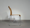 Stapelbare rieten, rotan stoelen (4) model S.21 op een verchroomde stalen structuur. Ontworpen door Tito Agnoli