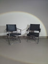 2 leren chromen klapstoelen