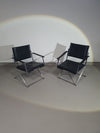 2 leren chromen klapstoelen
