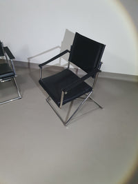 2 leren chromen klapstoelen