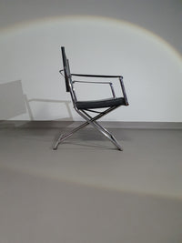 2 leren chromen klapstoelen