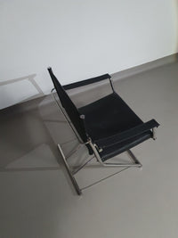 2 leren chromen klapstoelen