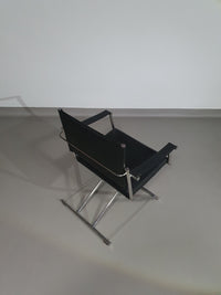 2 leren chromen klapstoelen