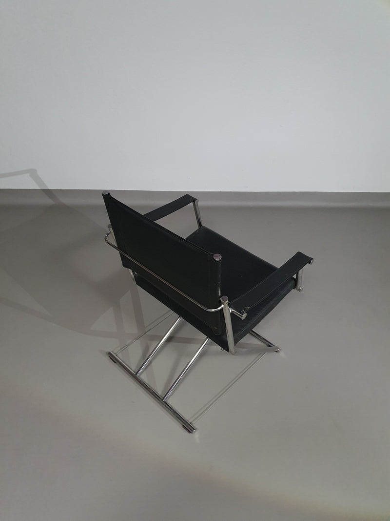 2 leren chromen klapstoelen