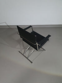 2 leren chromen klapstoelen
