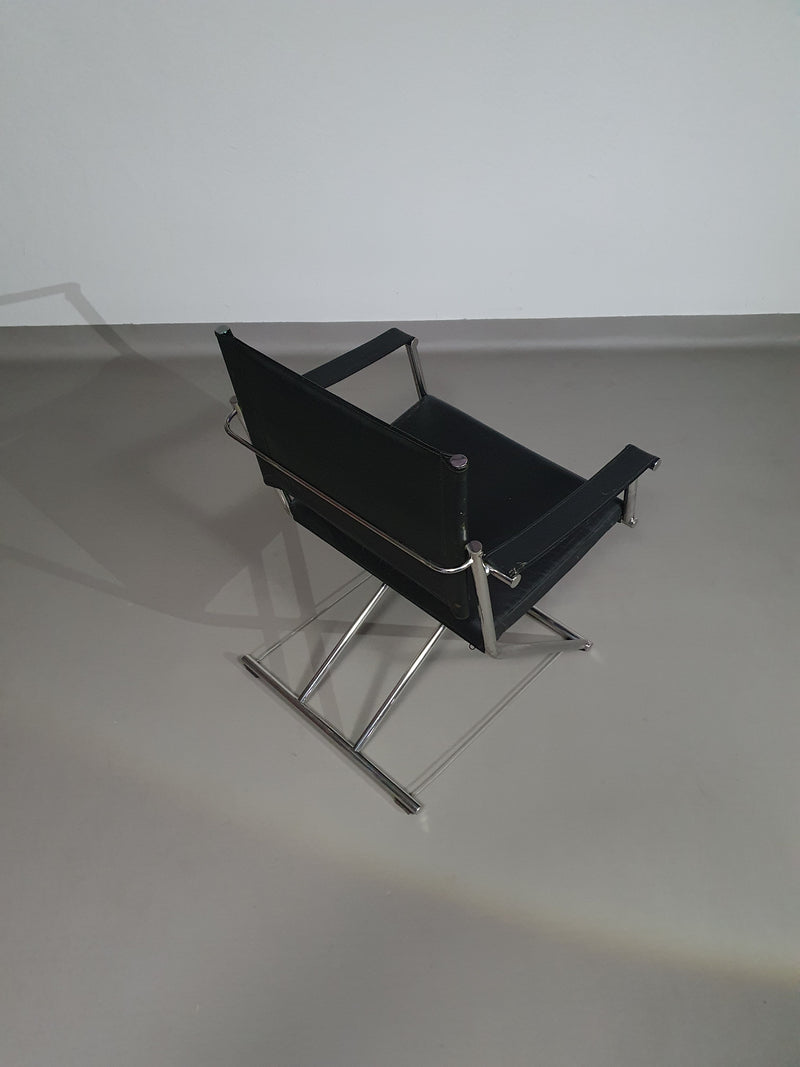 2 leren chromen klapstoelen