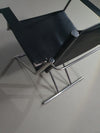 2 leren chromen klapstoelen