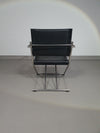 2 leren chromen klapstoelen