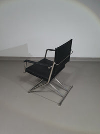 2 leren chromen klapstoelen