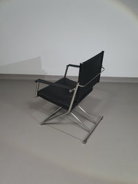 2 leren chromen klapstoelen