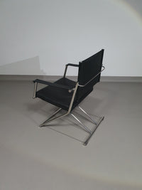 2 leren chromen klapstoelen