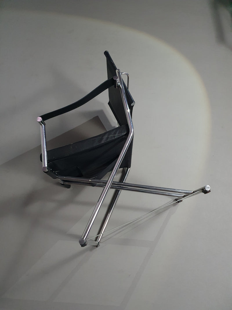 2 leren chromen klapstoelen