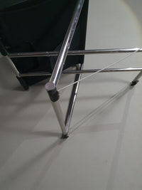 2 leren chromen klapstoelen