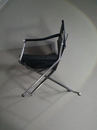 2 leren chromen klapstoelen