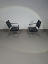 2 leren chromen klapstoelen