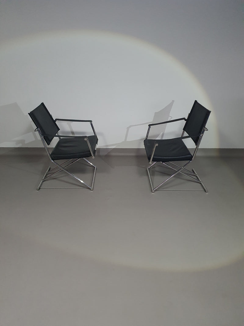 2 leren chromen klapstoelen