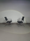 2 leren chromen klapstoelen