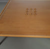 Rare coffee table 110 x 110 x height 35 cm
with 8 flange wooden / cork caps in the glass top.