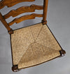 Set van 4 eikenhouten, rustieke, landelijke eetkamerstoelen met ladderrug en biezen zittingen uit de jaren 60