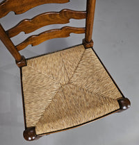 Set van 4 eikenhouten, rustieke, landelijke eetkamerstoelen met ladderrug en biezen zittingen uit de jaren 60