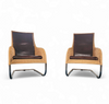 2 x Weighty rattan lounge chair 1990s