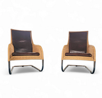2 x Weighty rattan lounge chair 1990s