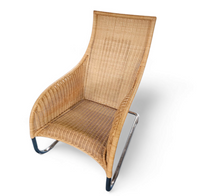 2 x Weighty rattan lounge chair 1990s