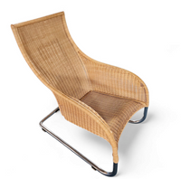 2 x Weighty rattan lounge chair 1990s