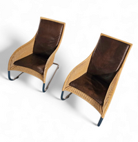 2 x Weighty rattan lounge chair 1990s
