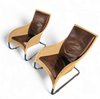 2 x Weighty rattan lounge chair 1990s