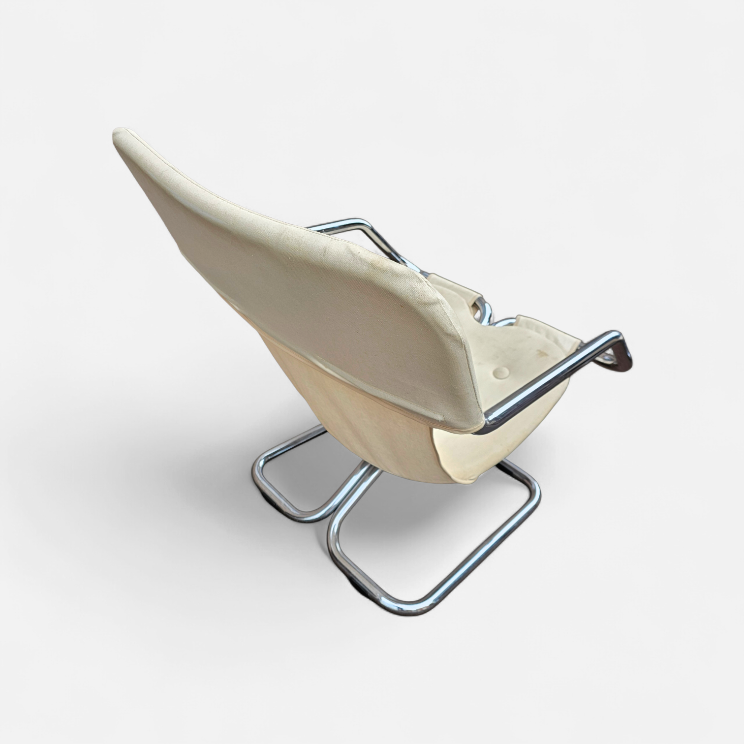 2 x Tubular chrome cantilever chair with a cream canvas sling