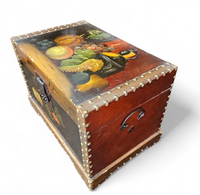 A VINTAGE FLORAL PAINTED DOME TOP TRUNK