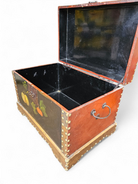 A VINTAGE FLORAL PAINTED DOME TOP TRUNK