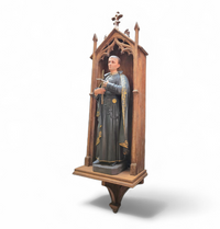 Statue of a religious figure / Patron Saint Gerard Majella / placed in a Gothic niche / labeled /